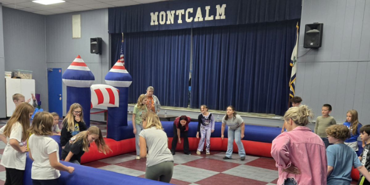 montcalm kids playing with new PE equipment