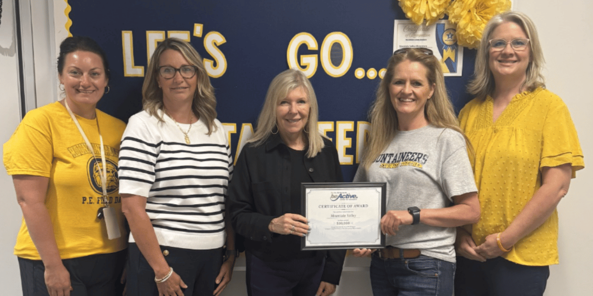 wv be healthy team presenting grant money