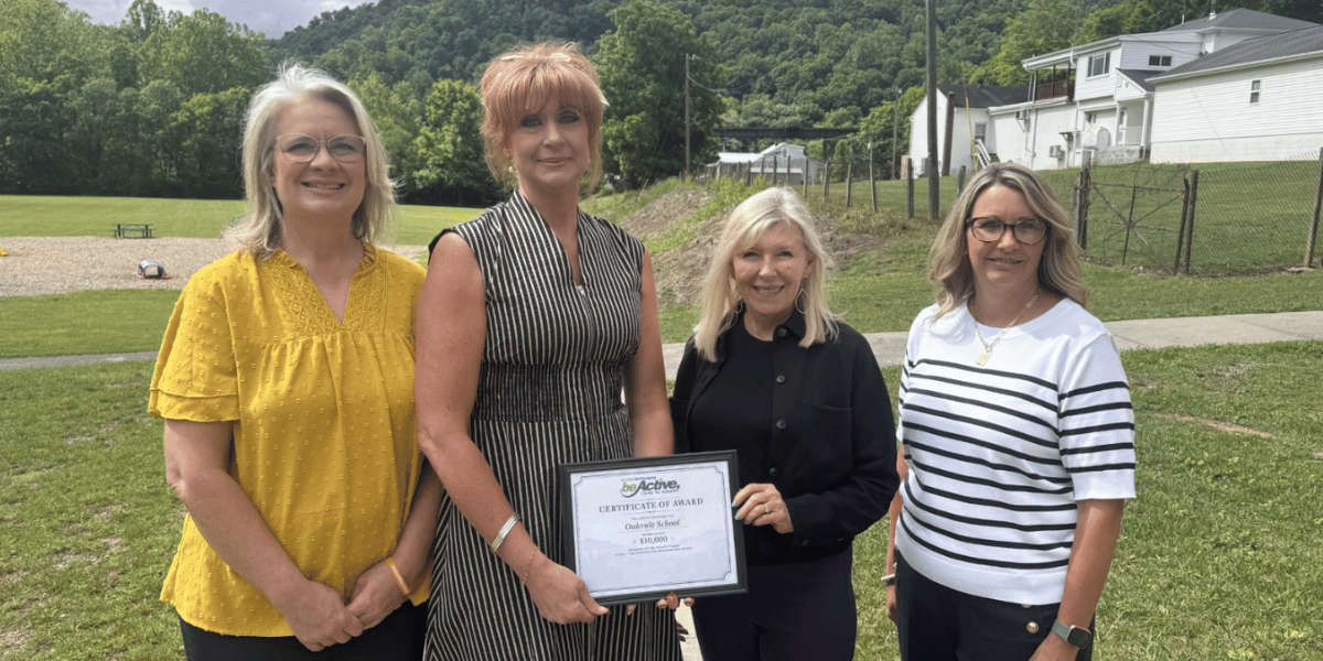 wv be healthy team presenting grant money